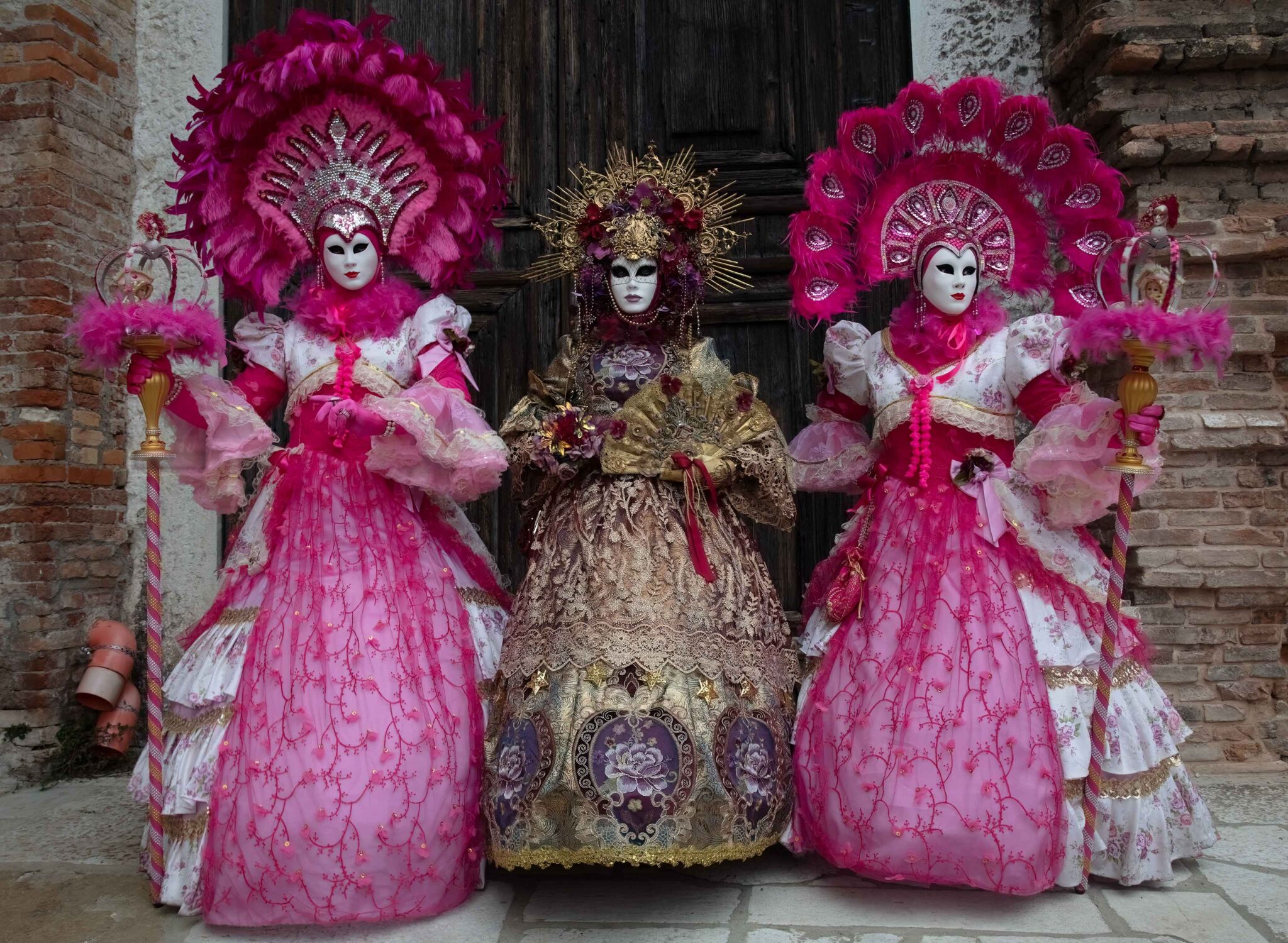 Three costumers in Venice Carnival 2023, Italy